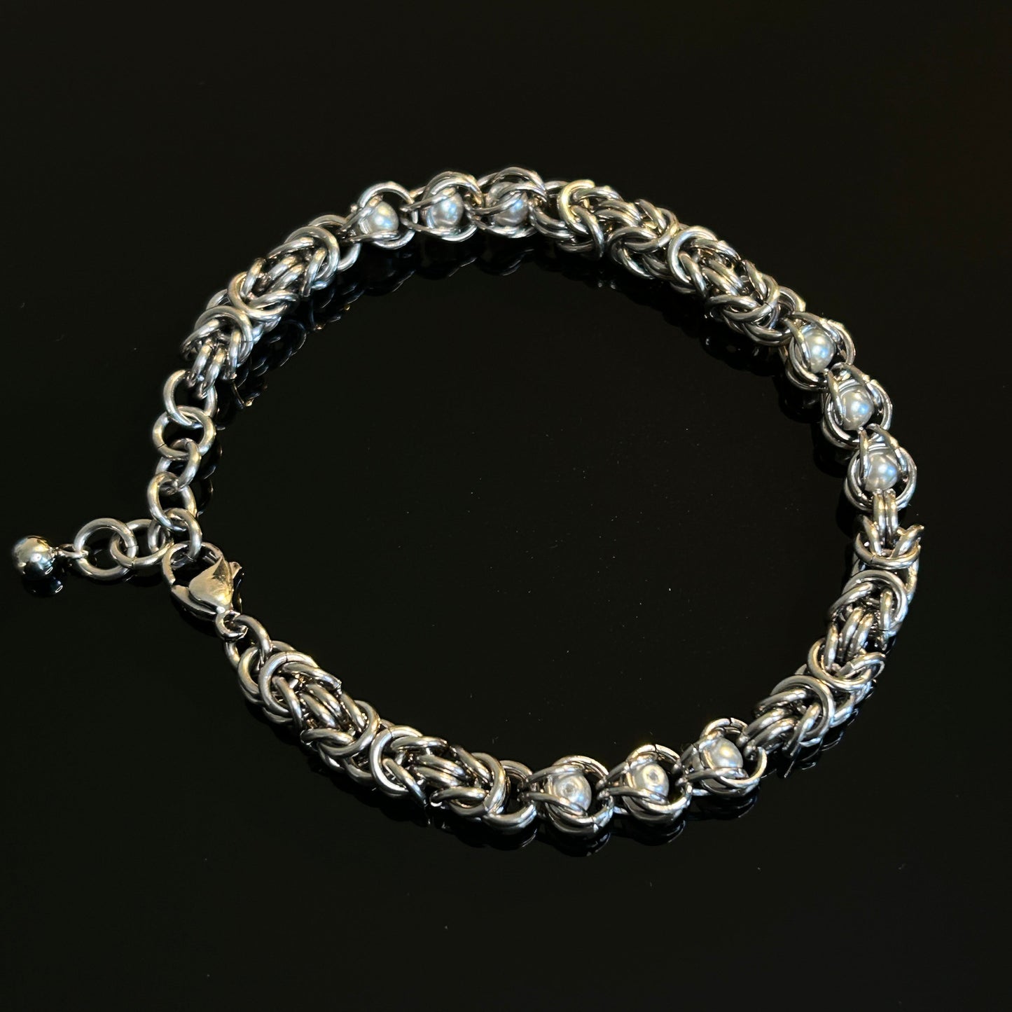 Stainless Steel Chainmail Bracelet With Trapped White Beads