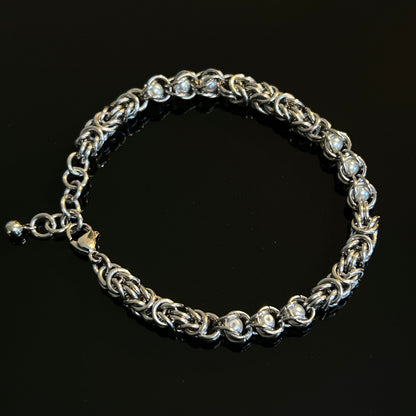 Stainless Steel Chainmail Bracelet With Trapped White Beads