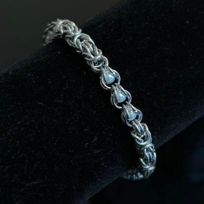 Stainless Steel Chainmail Bracelet With Trapped White Beads